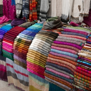Beautiful colors of alpaca scarfs at the Otavalo Market